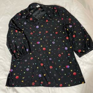 The fabric is breathable. Its a semi v-neck with a low collar.